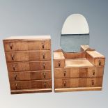 A 1930's oak five drawer chest with matching sunk centre mirrored dressing table