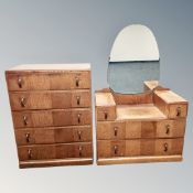 A 1930's oak five drawer chest with matching sunk centre mirrored dressing table