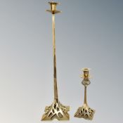 Two brass candlesticks in the Arts & Crafts style,