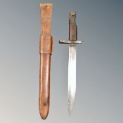 A British bayonet in scabbard with leather frog