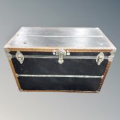 A studded vinyl steamer style shipping trunk,
