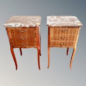 A pair of French style Kingwood veneered and marble topped bedside stands