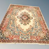 A machine made Persian designed carpet,