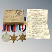 A WWII France and Germany Star, 1939-1945 Star and War Medal, in box of issue.