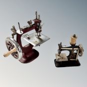 Two vintage child's sewing machines