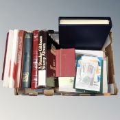 A box of stamp albums