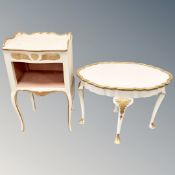 A cream and gilt shaped oval low table together with side table
