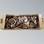 A box of costume jewellery, faux pearls,