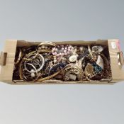 A box of costume jewellery, faux pearls,