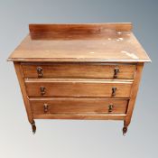 An Edwardian mahogany three drawer chest,