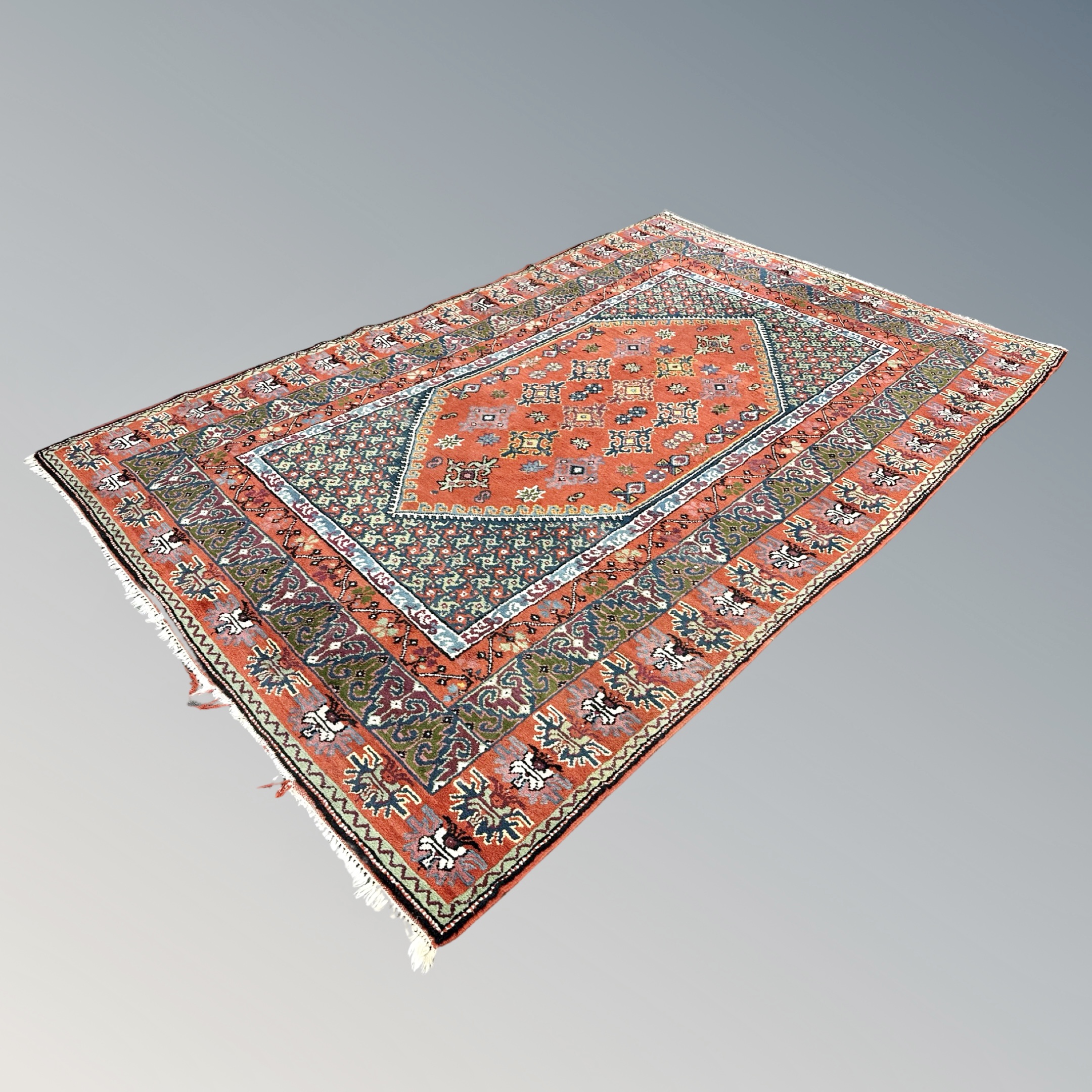 An eastern geometric woolen rug,
