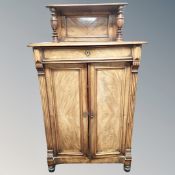 A 19th century walnut double door cabinet,