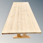 A rectangular pine refectory table,