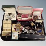 A tray of wristwatches, costume jewellery, silver ARP badge,