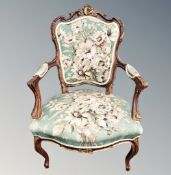 A French salon armchair in floral upholstery