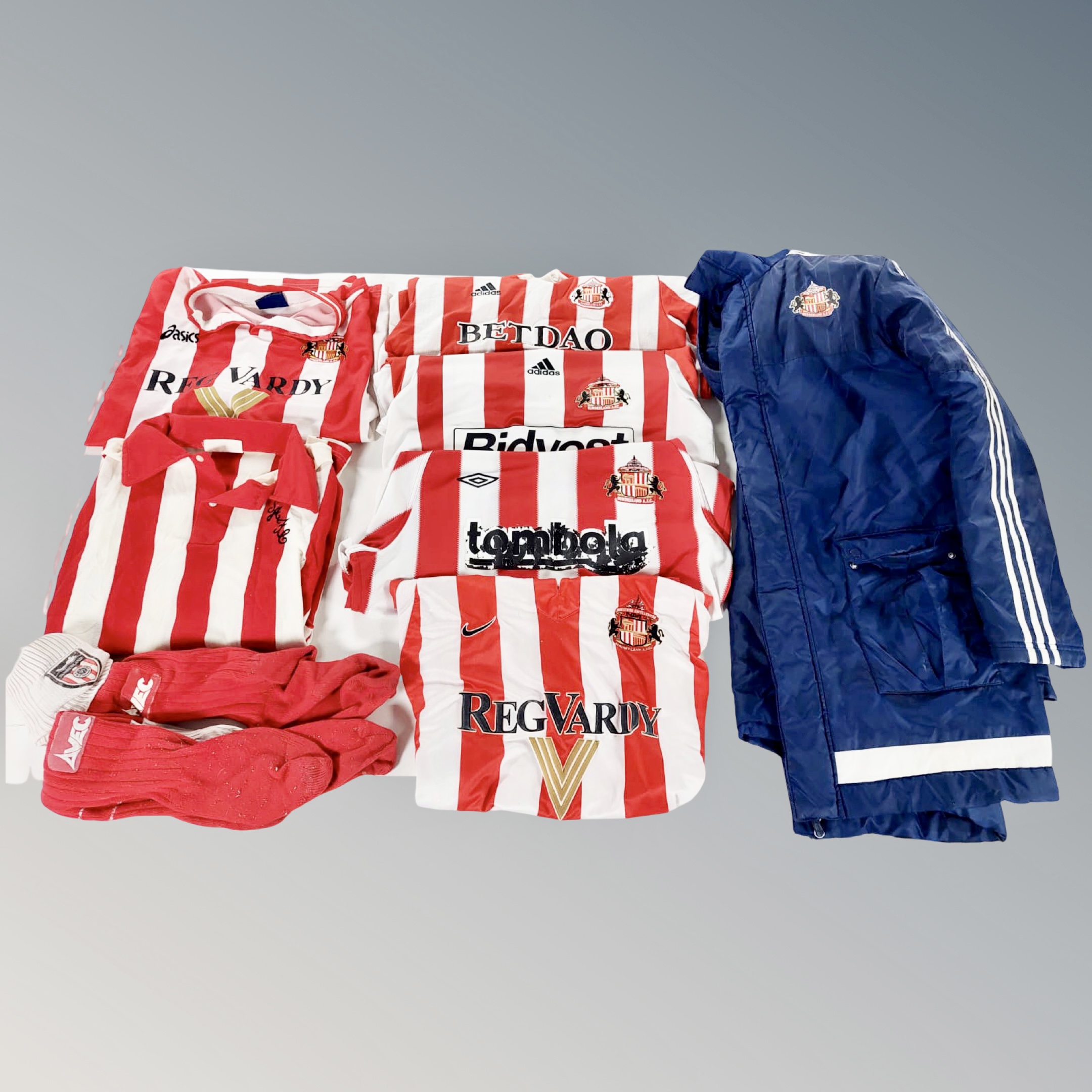 A box of Sunderland AFC clothing : socks, shirts,