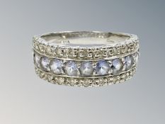 An 18ct white gold diamond and sapphire ring, 5.4g, size N.