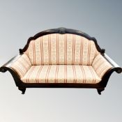 A continental scroll arm high backed salon settee in classical fabric,
