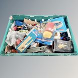 A crate of die cast vehicles,