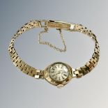 A lady's 9ct gold Accurist wristwatch on 9ct gold brick-link bracelet CONDITION REPORT: