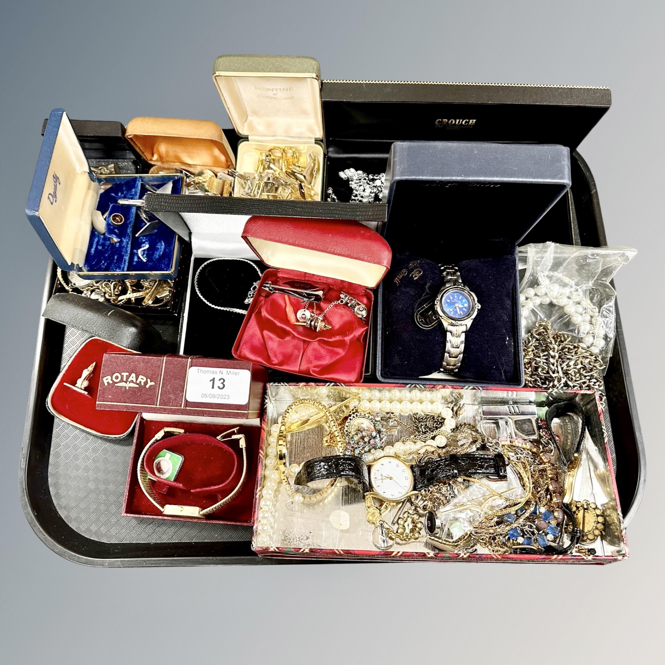 A tray of costume jewellery, cuff links,