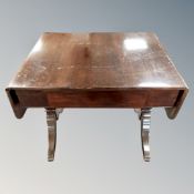 A 19th century mahogany drop leaf table