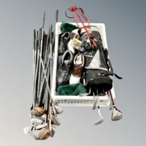 Three bundles of assorted golf clubs, crate of child's golf bag and half set of clubs, shoes,