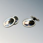 A pair of Norwegian silver and enamel cuff links