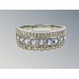 An 18ct white gold diamond and sapphire ring, 5.4g, size N.