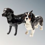 A Beswick black gloss Labrador and further Spaniel (2)
