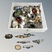 A box of antique and later jewellery, silver brooches,