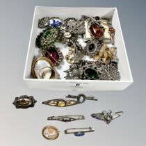 A box of antique and later jewellery, silver brooches,