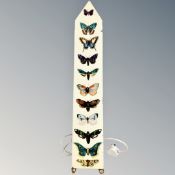 An Italian 20th century obelisk form metal table lamp decorated with butterflies,