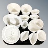 Twelve assorted cream ware jelly moulds, including Wedgwood examples, the earliest circa 1790,