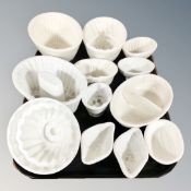 Twelve assorted cream ware jelly moulds, including Wedgwood examples, the earliest circa 1790,