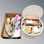 A mid century circular sewing box, stool and contents, a box of threads, wool,