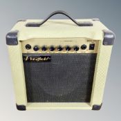 A Westfield guitar amplifier with lead.