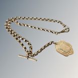 A 9ct gold watch chain with T-bar and fob CONDITION REPORT: 29.7g.