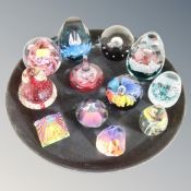 Twelve contemporary glass paperweight including Caithness,