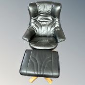 A Scandinavian black leather adjustable armchair with footstool