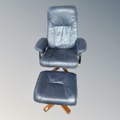 A Scandinavian blue leather adjustable armchair with footstool