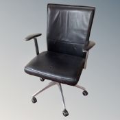 An executive adjustable office armchair