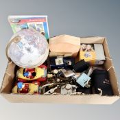 A box of globe, digital camcorder, wristwatches,
