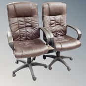 A pair of Executive high backed swivel armchairs