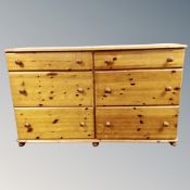 A pine six drawer block chest