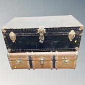 A vintage metal bound shipping trunk and a wooden bound trunk