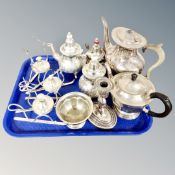 A tray of silver plated tea wares, candlestick, three oil burners on stands.