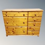A pine eight drawer block chest
