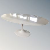 A Scandinavian white high gloss oval pedestal dining table, 198cm long by 121cm wide by 74cm high.