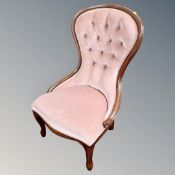 A Victorian style nursing chair in pink dralon